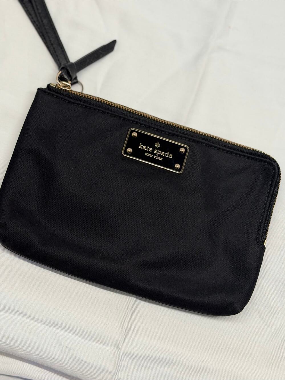 Kate Spade New York Black Wristlet – Gold Hardware – Zip Closure – Minimalist